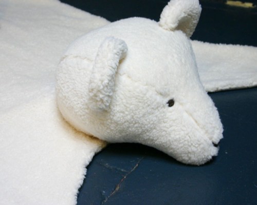 I used a polyester heavy duty sheepskin for this rug so it could stand the test of time and be easily steam cleaned with a small steam machine. 