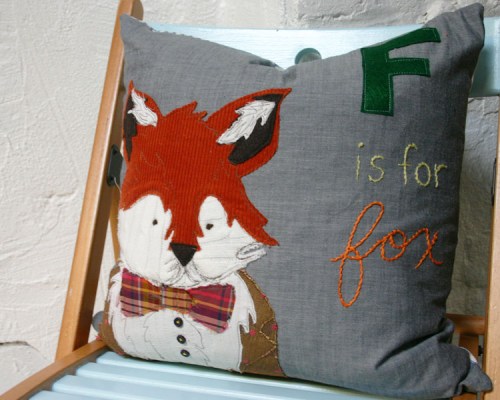 This dapper fox pillow has nothing to do with making stuffed animals...but isn't it cute?!   I made it for my glider! 