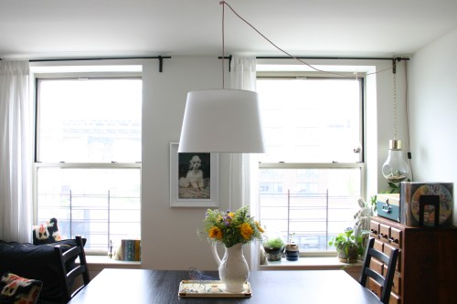 Our new light is just a shade from Ikea and a covered cord! 