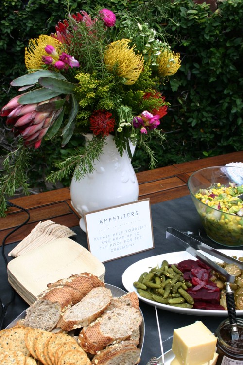 I mixed protea with unfussy wildflowers and even herbs to create wild, unstructured floral arrangements that were super cheap. 