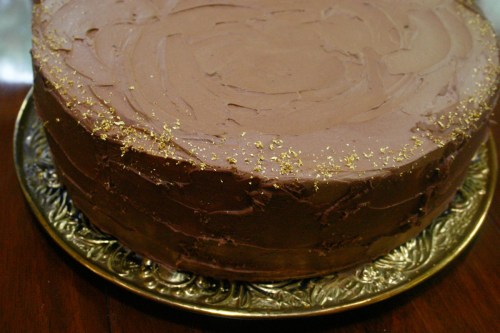 My sister-in-law bought edible gold leaf sprinkles for the edge of the two single tiered cakes.