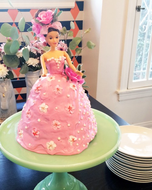 After eating, we moved inside for (more) cake and gifts. This ridiculous prom queen cake was obviously a must. 