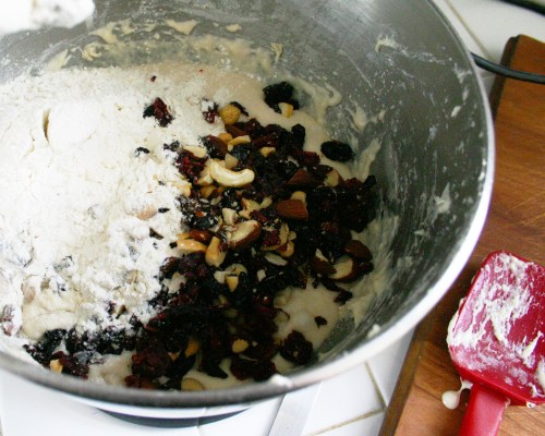 Add 1 cup of flour with the chopped nuts and fruit.  