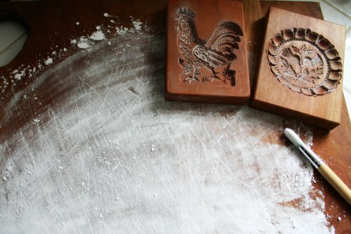 Coat your surface with confectioners sugar as well so the dough doesn't stick when you roll it out.