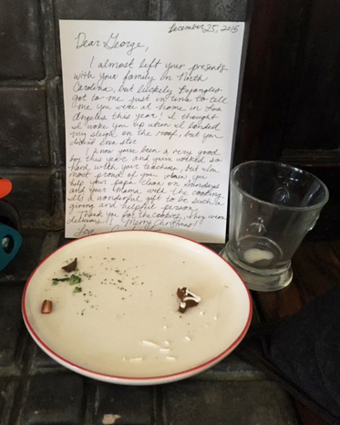 Santa always writes us a letter at night while he eats his cookies.  