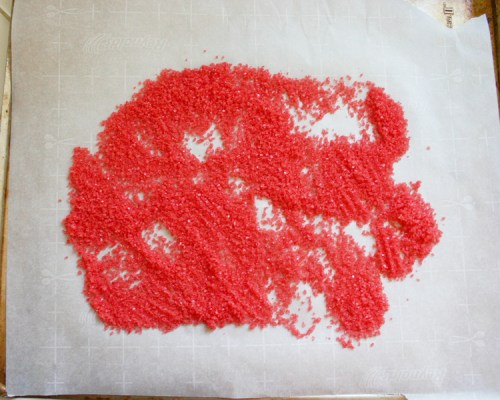 I didn't have red sanding sugar, so I added red food color to white sugar, mixed well and then spread out to dry. You can make any color sugar this way and it will save you lots of money!