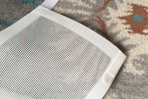 I used 3M picture hanging velcro so I could remove it in the future, but you could use any sticky velcro to secure the bottom edge of the mesh covers to the ledge. 