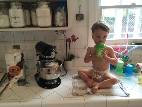 Teaching G all about making bread!  