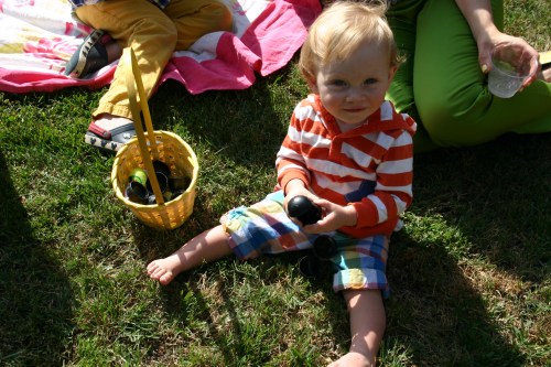 If you can see past that adorable face, I chose plastic chalkboard eggs for the egg hunt so I could skip the candy and fill them with colored chalk instead.  