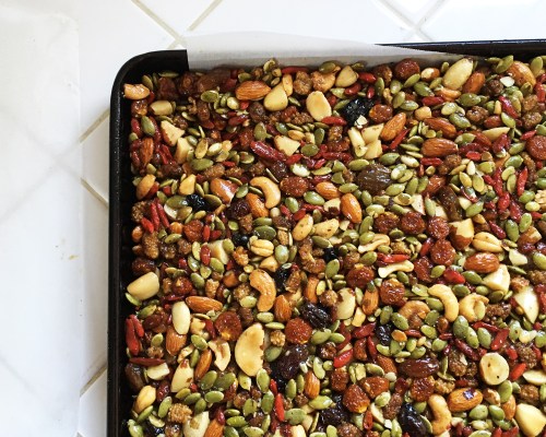 A combo of oiled hands and oiled parchment work best in pressing the mix into a firm block ready for chilling. 