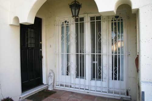 The front has French doors leading into the dining room.  I swear no one knew they were there.  