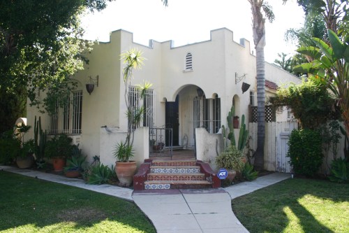 Before the painters came, we removed the two Bird of Paradise trees from the front of the house.  They felt strangely random and visually messy.  
