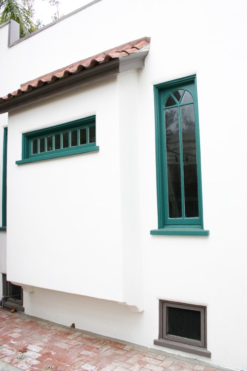 I went with a deep teal for the windows and a light coffee color for the trim under the terracotta and all functional wood work.  